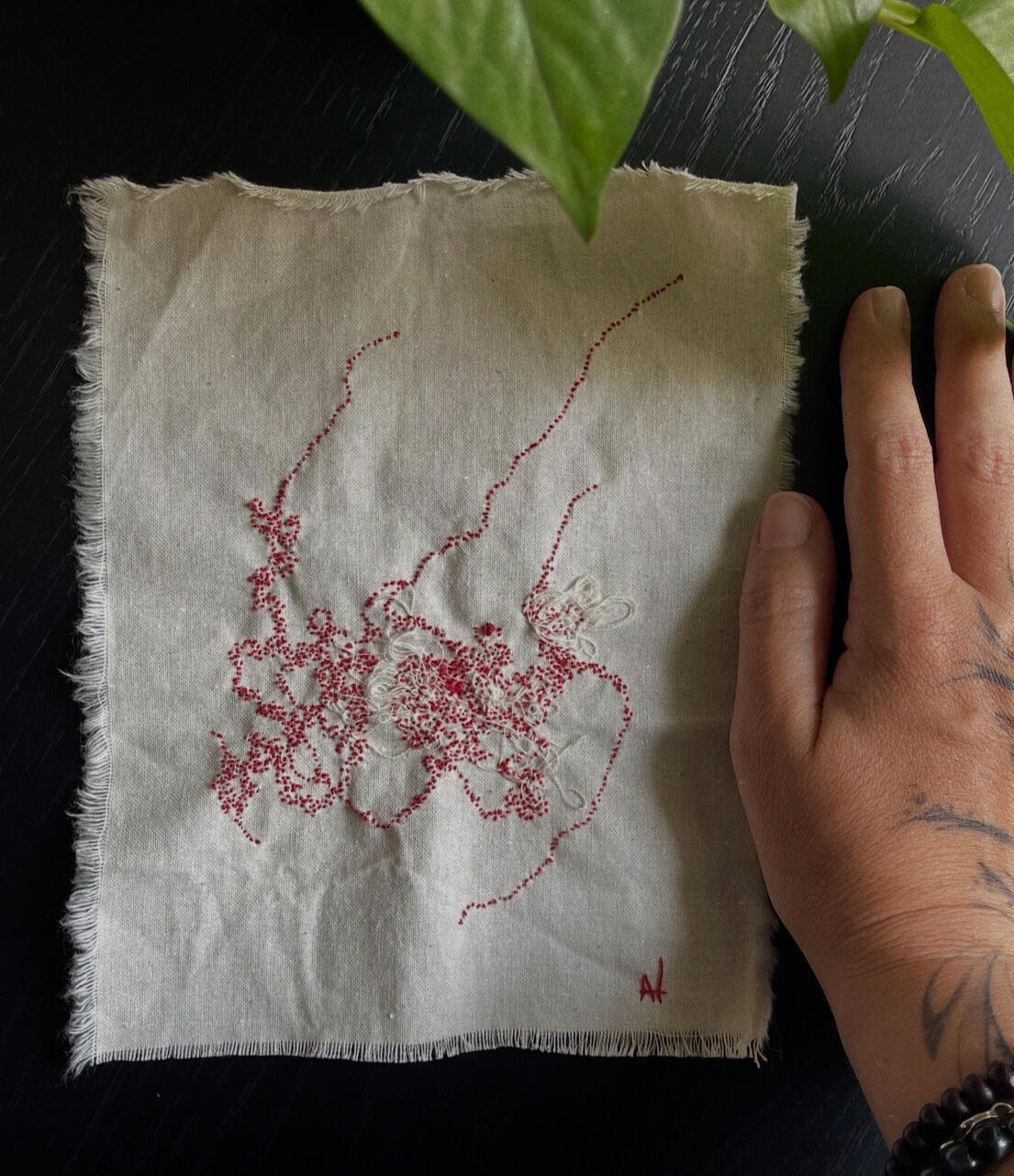 “Blood drops on the snow”,2026. Hand embroidery on linen, size 15x19cm/6”x7.5”.