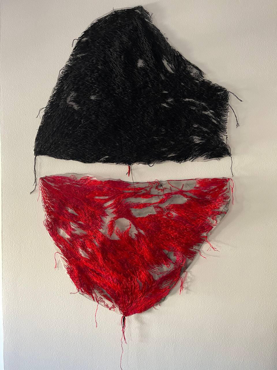 "As above so below", 2024. Hand embroidery on tulle, black part 63x45 cm, red part 60x46 cm